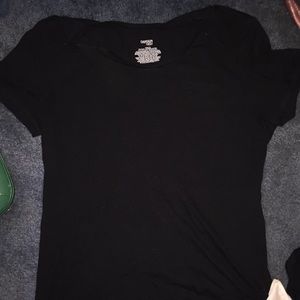 Black Shirt With A Flower Like Pattern